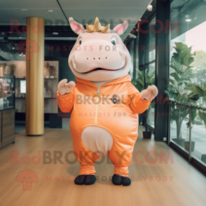 Peach Rhinoceros mascot costume character dressed with a Jeggings and Digital watches