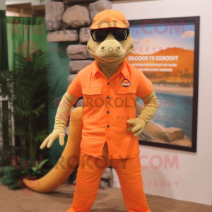 Orange Komodo Dragon mascot costume character dressed with a Bermuda Shorts and Eyeglasses