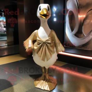 Gold Swan mascot costume character dressed with a Wrap Dress and Bow ties