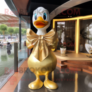 Gold Swan mascot costume character dressed with a Wrap Dress and Bow ties