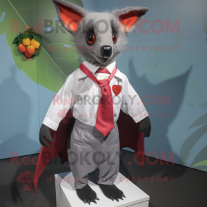 Red Fruit Bat mascot costume character dressed with a Poplin Shirt and Tie pins