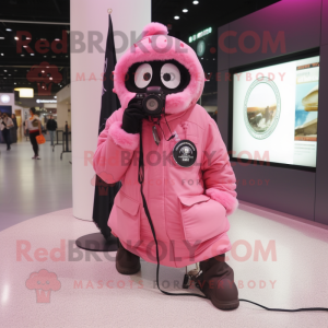 Pink Camera mascot costume character dressed with a Parka and Digital watches