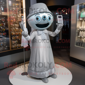 Silver Phone mascot costume character dressed with a Cocktail Dress and Beanies