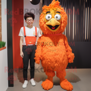 Orange Fried Chicken mascot costume character dressed with a Skinny Jeans and Suspenders