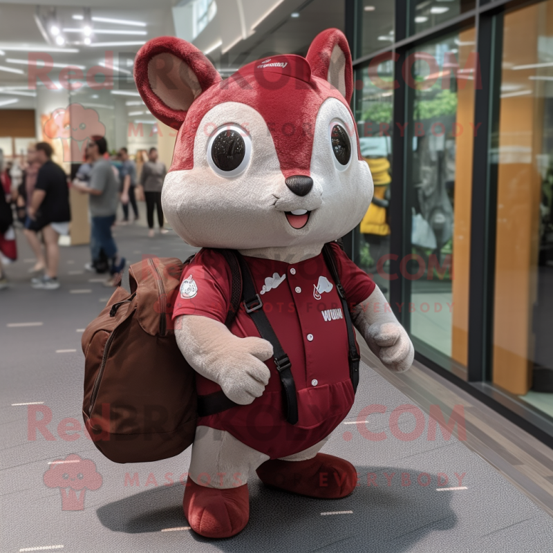 Maroon Flying Squirrel mascot costume character dressed with a Bootcut Jeans and Messenger bags