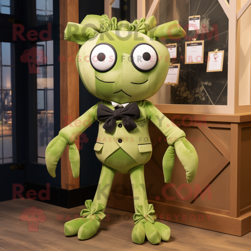 Olive Spider mascot costume character dressed with a Playsuit and Bow ties Olive Spider mascot costume character dressed with a Playsuit and Bow ties