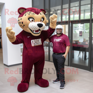 Maroon Jaguar mascot costume character dressed with a Henley Shirt and Watches