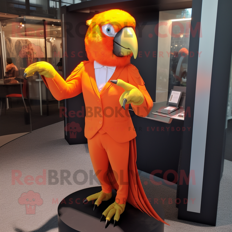 Orange Parrot mascot costume character dressed with a Sheath Dress and Cufflinks Orange Parrot mascot costume character dressed with a Sheath Dress and Cufflinks