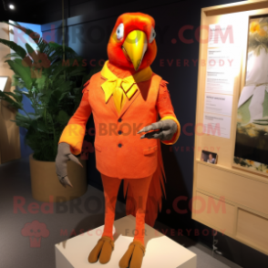 Orange Parrot mascot costume character dressed with a Sheath Dress and Cufflinks