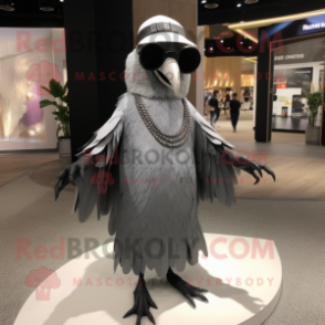 Silver Crow mascot costume character dressed with a Empire Waist Dress and Sunglasses