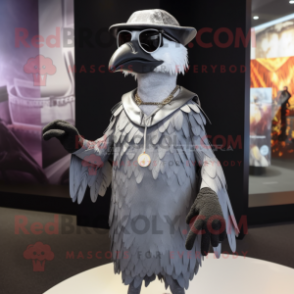 Silver Crow mascot costume character dressed with a Empire Waist Dress and Sunglasses