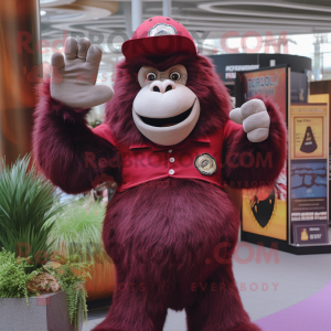 Maroon Gorilla mascot costume character dressed with a T-Shirt and Hat pins