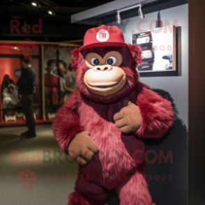 Maroon Gorilla mascot costume character dressed with a T-Shirt and Hat pins