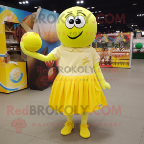 Lemon Yellow Handball Ball mascot costume character dressed with a Wrap Skirt and Messenger bags