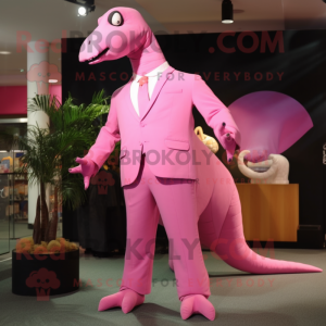 Pink Diplodocus mascot costume character dressed with a Suit Jacket and Shoe clips