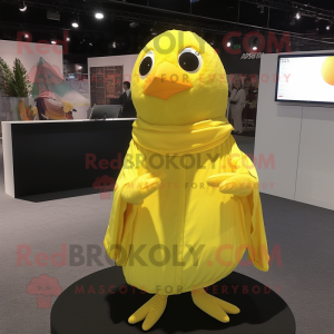 Lemon Yellow Canary mascot costume character dressed with a Poplin Shirt and Shawl pins