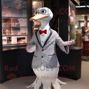 Silver Goose mascot costume character dressed with a Blazer and Cummerbunds
