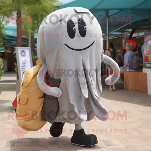 Gray Jellyfish mascot costume character dressed with a Waistcoat and Tote bags