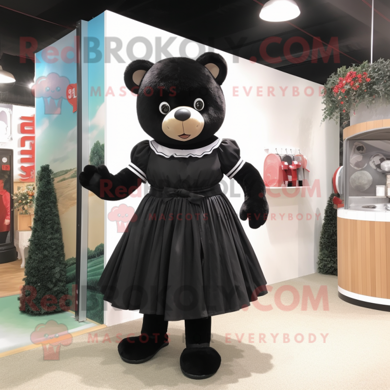 Black Teddy Bear mascot costume character dressed with a A-Line Skirt and Shoe clips Black Teddy Bear mascot costume character dressed with a A-Line Skirt and Shoe clips