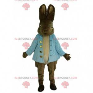 Mascotte de lapin marron très réaliste avec un gilet bleu -