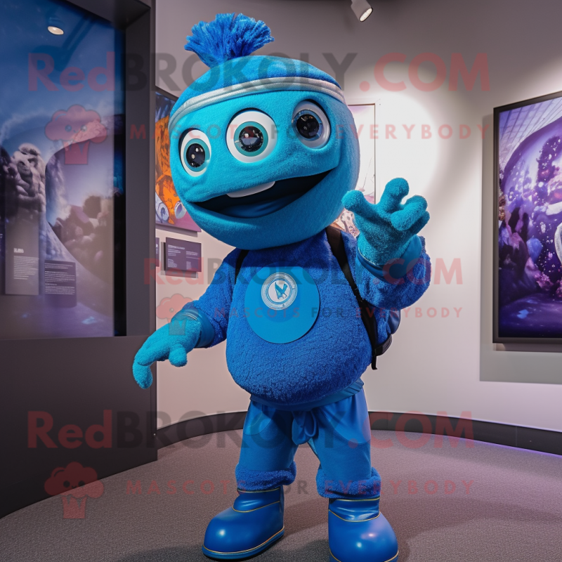 Blue Momentum mascot costume character dressed with a Playsuit and Rings Blue Momentum mascot costume character dressed with a Playsuit and Rings