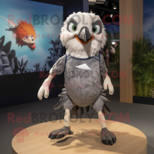 Gray Haast'S Eagle mascot costume character dressed with a Running Shorts and Necklaces