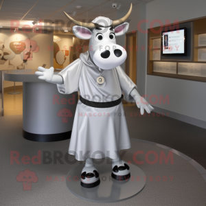 Silver Guernsey Cow mascot costume character dressed with a Circle Skirt and Tie pins