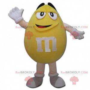 Gigantische gele M & M's mascotte, chocoladekostuum -