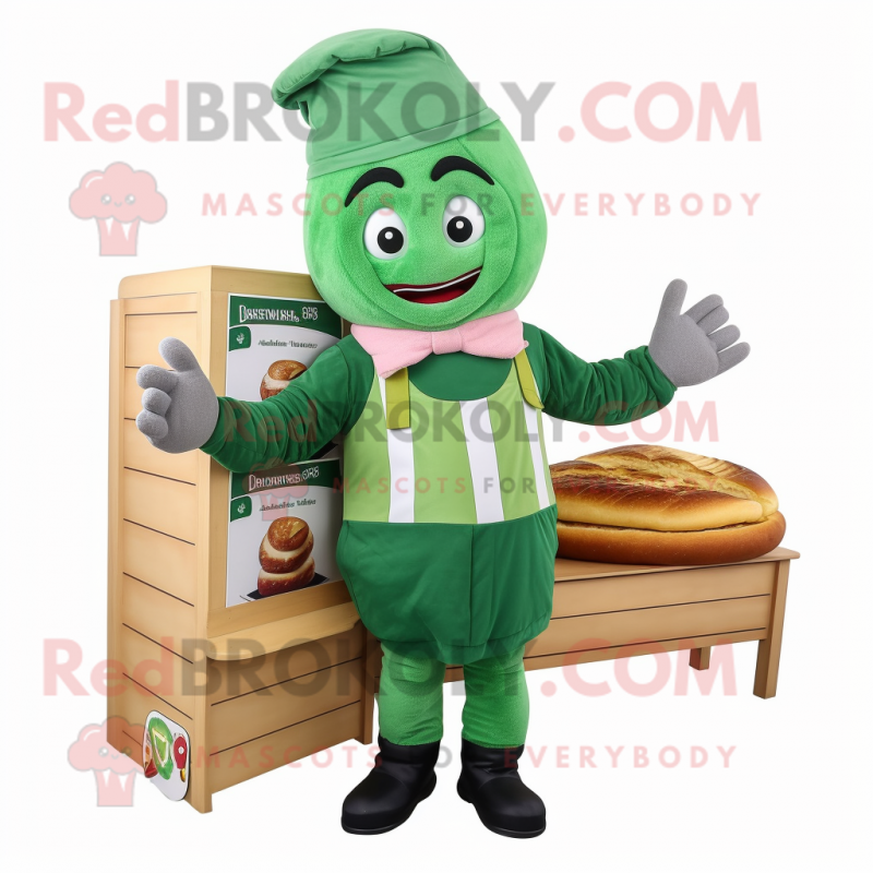 Green Croissant mascot costume character dressed with a Dungarees and Beanies