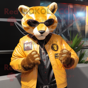 Gold Jaguarundi mascot costume character dressed with a Leather Jacket and Lapel pins