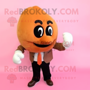 Peach Boxing Glove mascot costume character dressed with a Blazer and Headbands