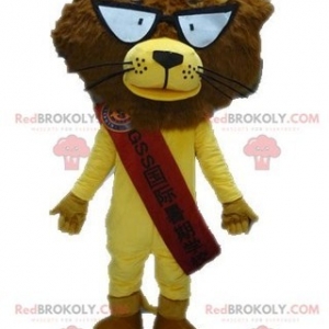 Mascot of the day: Yellow and brown lion mascot with glasses. Discover @redbrokoly #mascots - Link : https://bit.ly/2Znokkz - REDBROKO_04601 #mascots #mascot #event #costume #redbrokoly #marketing #customized #and #with #brown #yellow #costume #lion #glasses #custom - https://www.redbrokoly.com/en/lion-mascots/4601-yellow-and-brown-lion-mascot-with-glasses.html